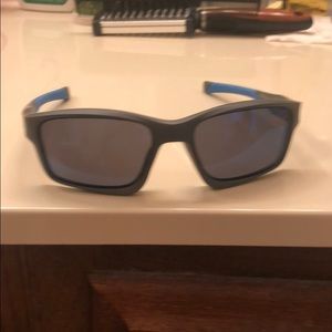 Blue and grey Oakley sunglasses